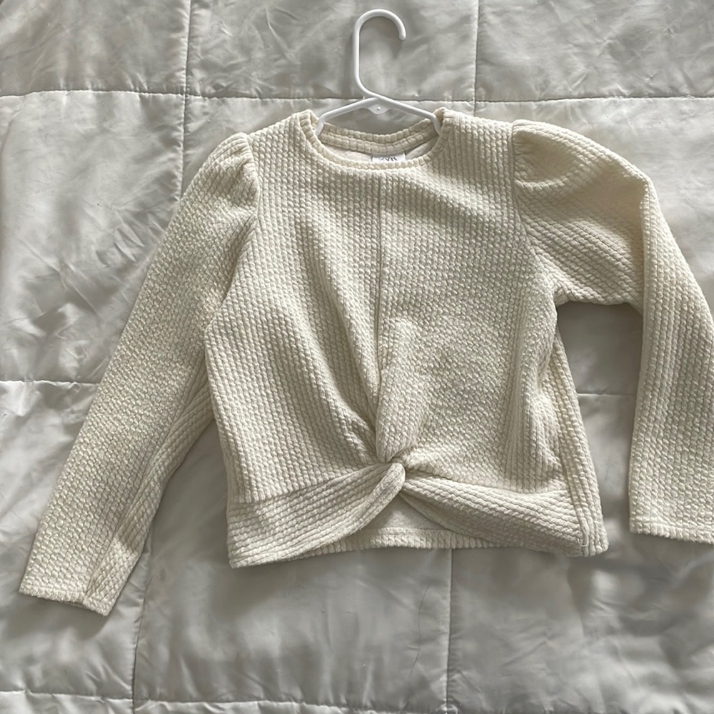 Girls top with gathered detail at bottom